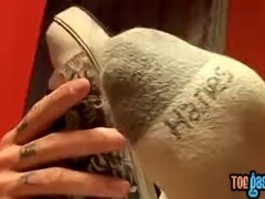 Thug jock Evan Heinze caressing socks in foot fetish solo Thumb