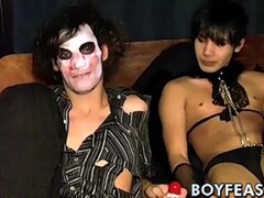 Twinks in scary costumes perform blowjobs and masturbation Thumb