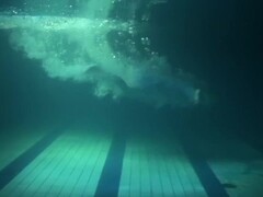 Retro underwater swimming pool action Thumb